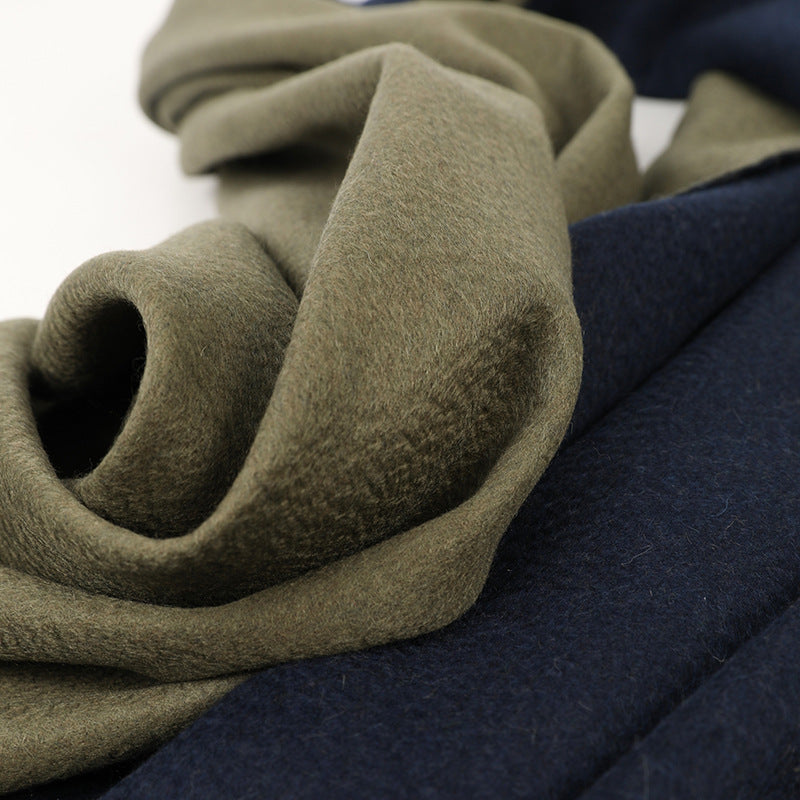 Evergreen and Indigo Colour in one scarf- Pure Cashmere Shawl-Double Sided Scarf-This remarkable feature is achieved through a meticulous weaving process that employs 20-count single yarn pure cashmere. Each strand is carefully interwoven to ensure the colors remain vibrant and separate, preventing any bleed-through that diminishes quality.
The use of finer yarn enhances the shawl's aesthetic appeal, imbuing it with an unparalleled softness and elegance.