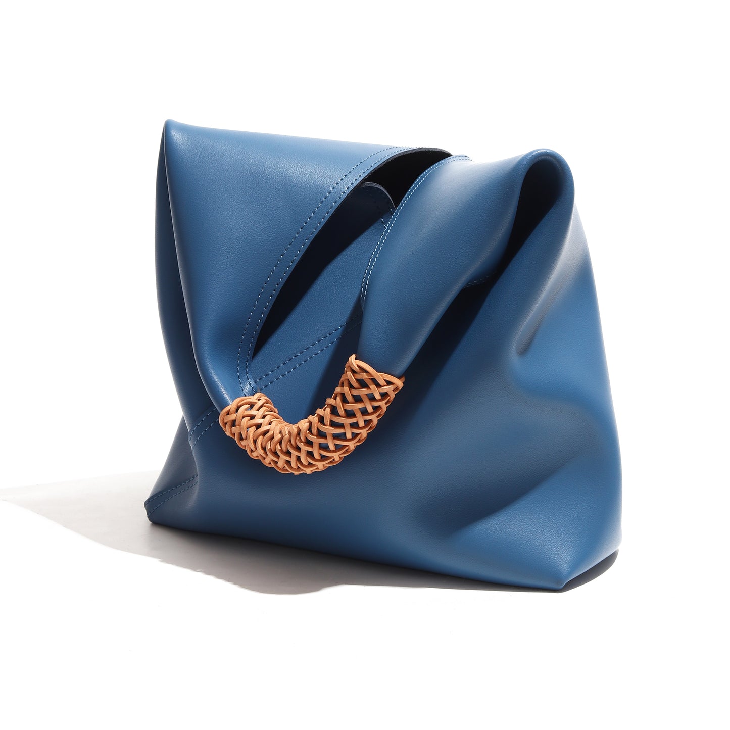 The Essential Enclave|Bucket Bag Masterpiece|Small Grain Cowide Leather-Crafted from premium cowhide through a plant-based tanning process, the bag's body showcases the natural beauty of the leather while remaining crease-free and maintaining its shape even when fully loaded.