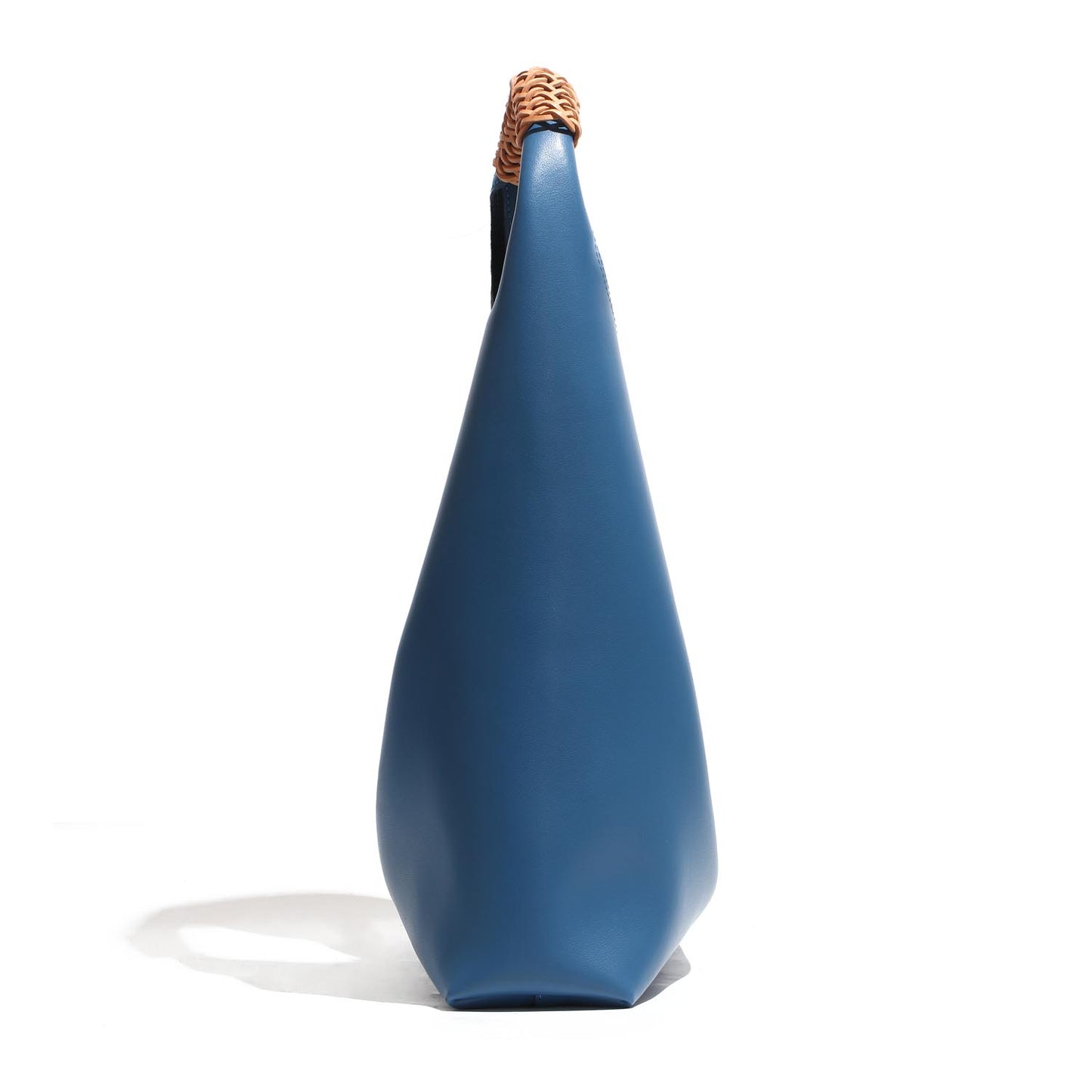 The Essential Enclave|Bucket Bag Masterpiece|Small Grain Cowide Leather-Our oversized bucket bag is a testament to understated elegance and practicality, designed with a soft yet vivid saturation that boasts a tactile, three-dimensional form exuding unique style.