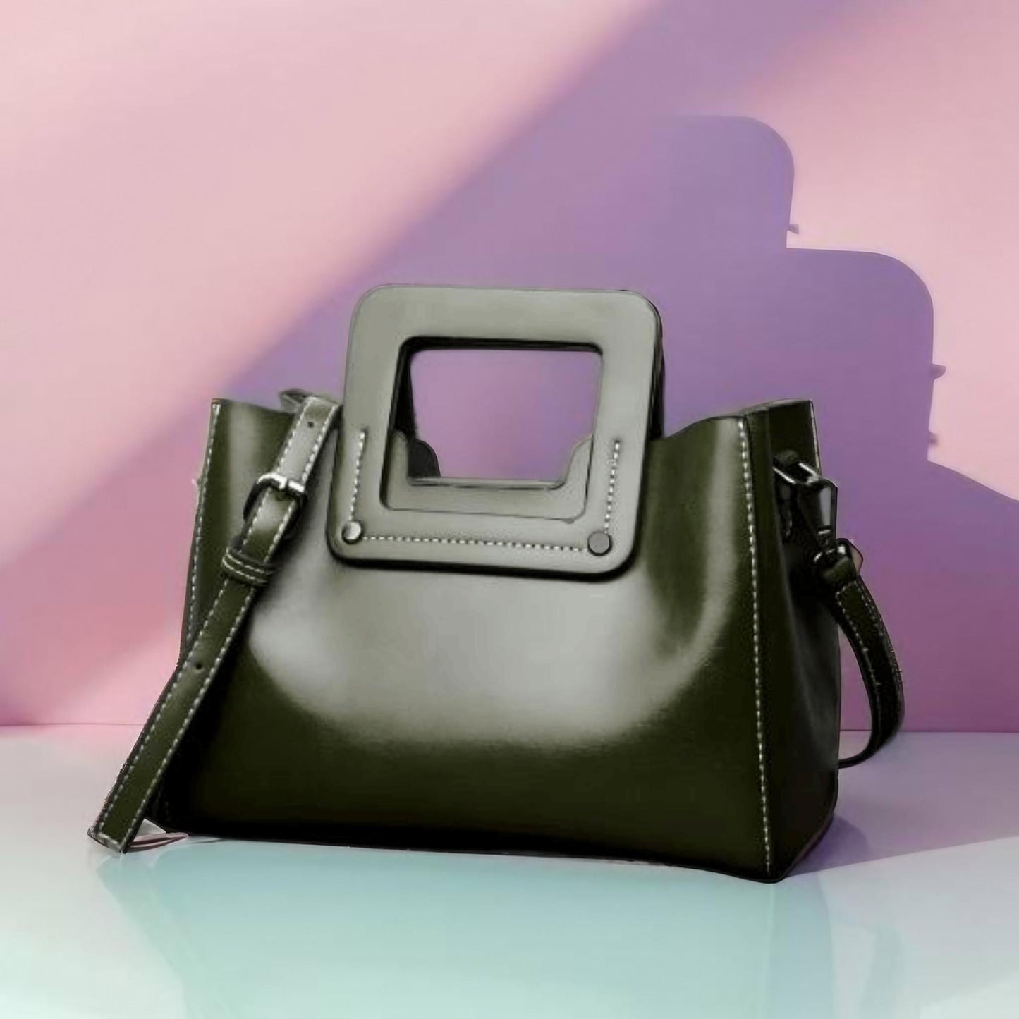 Introducing Quatrefoil Charm Satchel collection where impeccable craftsmanship meets innovative design. Made from luxurious waxed cowhide leather, this selection shines with an irresistible gloss and a soft feel, redefining opulence. 