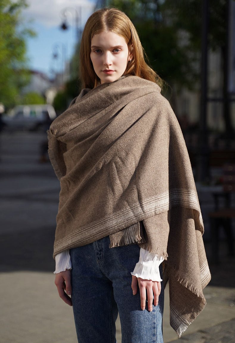 The finer combed fibers of the lambswool lend an exceptionally smooth and silky texture, surpassing even that of cashmere. Our shawl is dyed with high-quality imported dyes that are eco-friendly and safe for human contact, ensuring vibrant colors that are gentle on your skin.