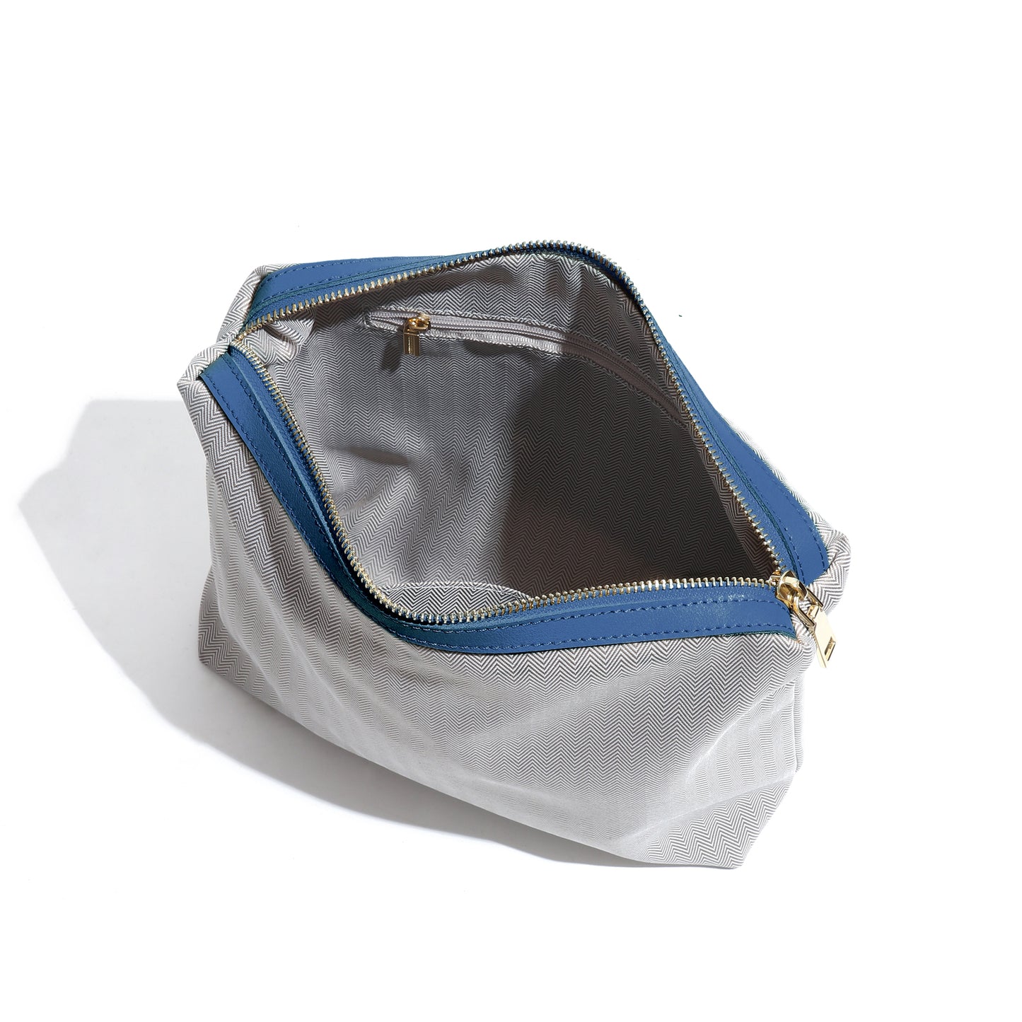 The Essential Enclave|Bucket Bag Masterpiece|Small Grain Cowide Leather-In a thoughtful departure from traditional designs, we've included a secure zippered internal pocket to protect your belongings. Crafted from lightweight materials, it offers a convenient and safe compartmentalized space within the heavier pure leather exterior.
